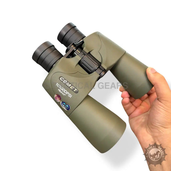 Olive green Comet 10x50DPSI binoculars with focus wheel and adjustable eyepieces in hand