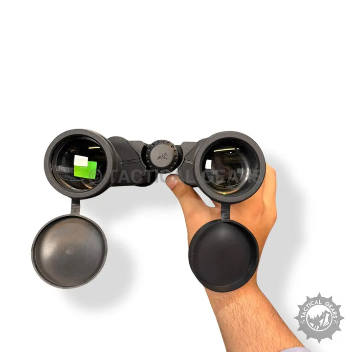 Black Comet 7x50 Binoculars with attached lens caps for clear viewing experience