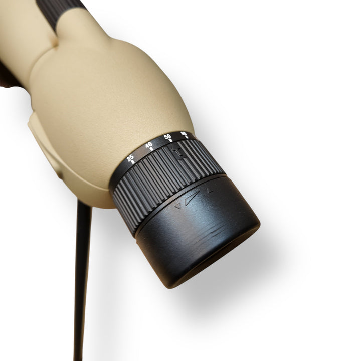 Tan-colored spotting scope with black zoom ring and eyepiece cover in Complete Spotting Scope Kit with Mobile Clip