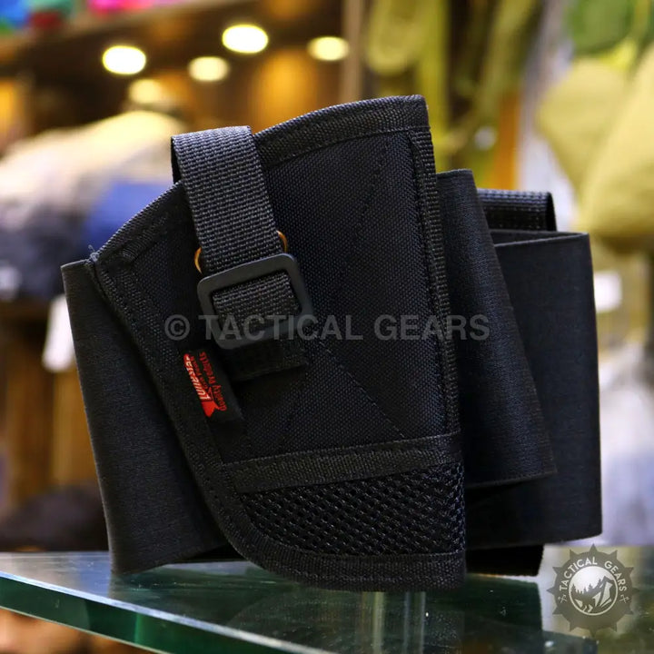 Black nylon tactical belly band holster with adjustable strap and mesh pocket