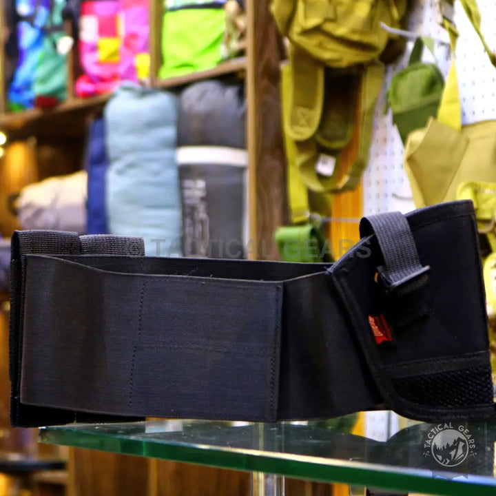 Black tactical belt with multiple pockets and adjustable strap for Concealed Belly Band Holster