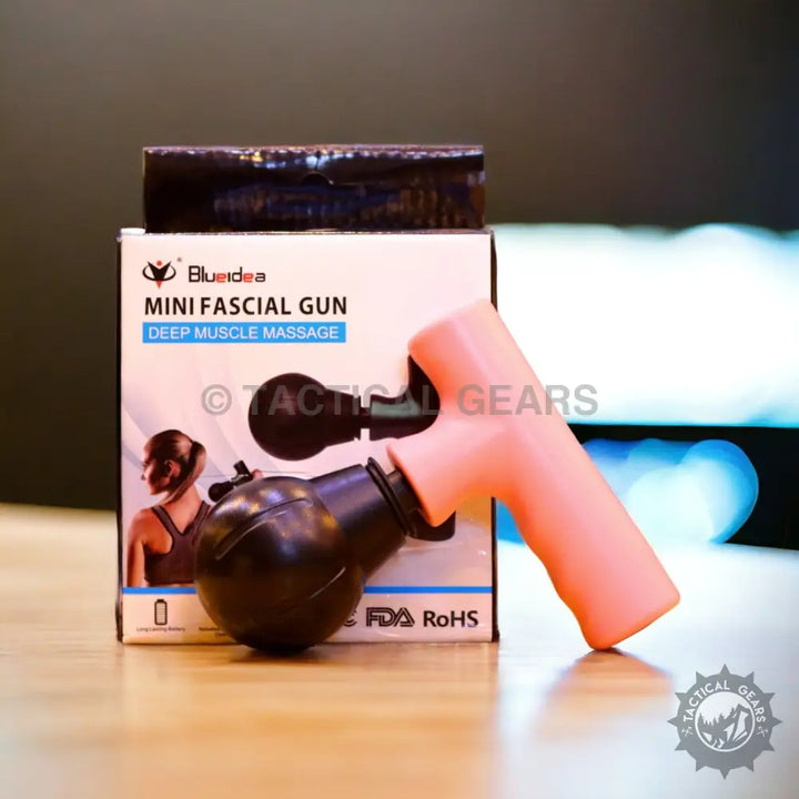 Mini Fascial Gun with pink T-shaped handle and black massage head for deep muscle relief