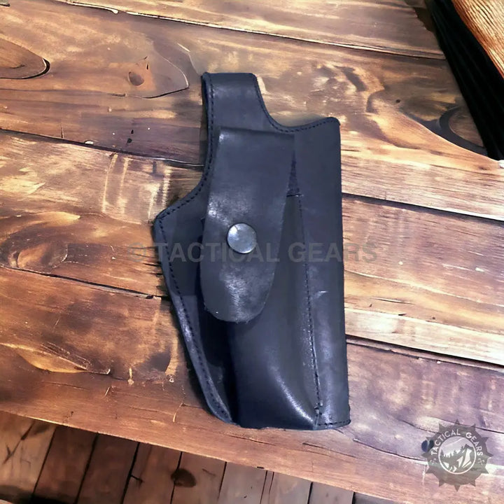 Universal Cover black leather gun holster with snap closure for secure carry