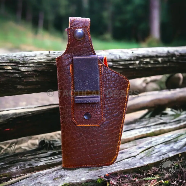 Universal Cover brown leather gun holster with metal belt clip and snap closure