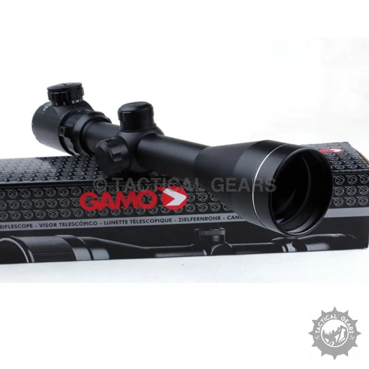 Black rifle scope with adjustable turrets and silver-ringed objective lens for GAMO 3-9X40 Red/Green Illuminated Scope
