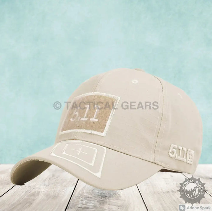 Beige tactical baseball cap with prominent square patch front for outdoor activities