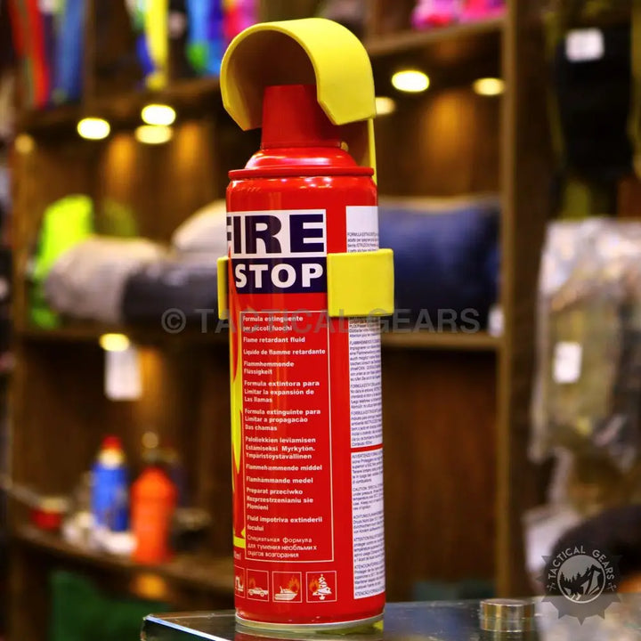 Emergency portable fire extinguisher with red body and yellow mounting bracket
