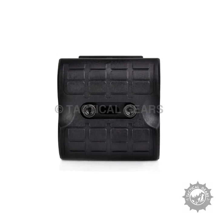 Black tactical gear accessory with textured grip surface for AK47 magazine coupler