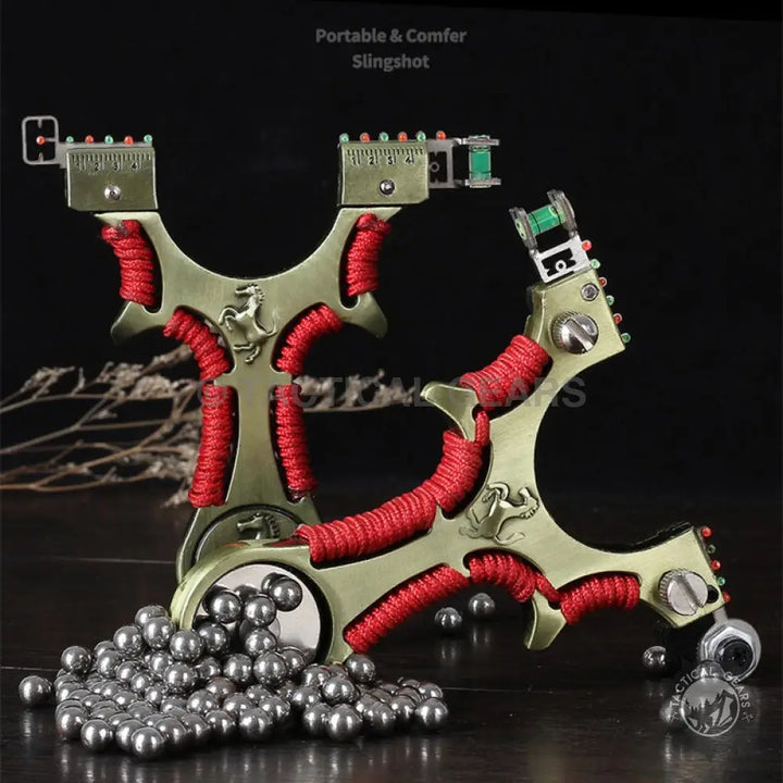 Ferrari Hunting Slingshot With Laser featuring two metallic red-cord-wrapped slingshots with aiming sights and steel ball ammunition width