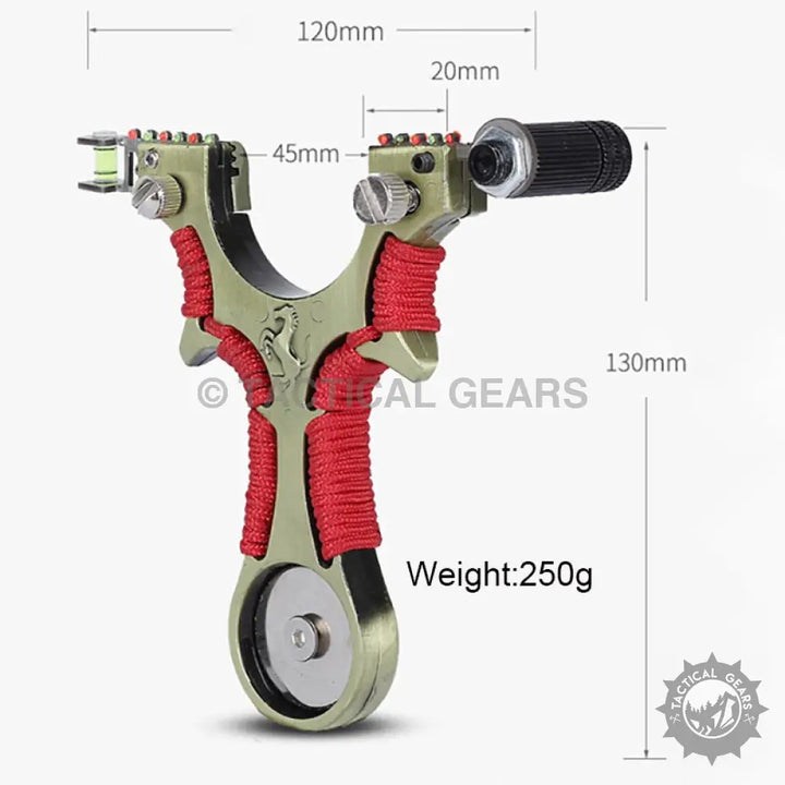 Olive green metal slingshot with red paracord wrapping, level, laser sight, and width details