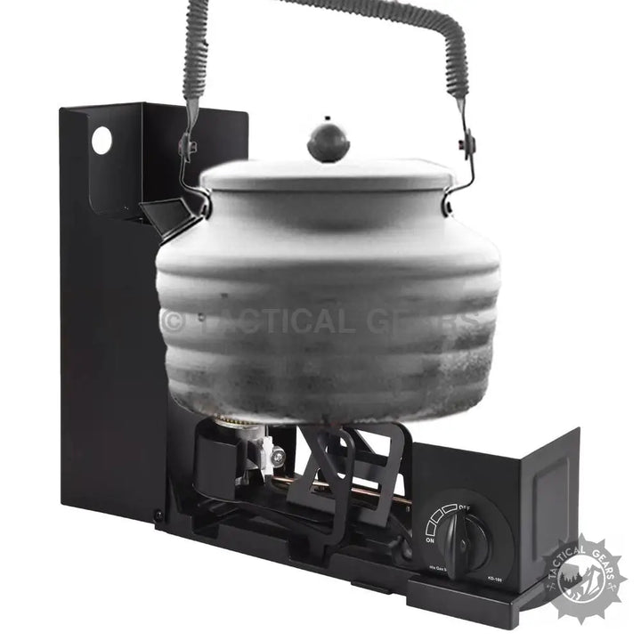 Black portable camping stove with large grey kettle, ideal cooking solution for camping