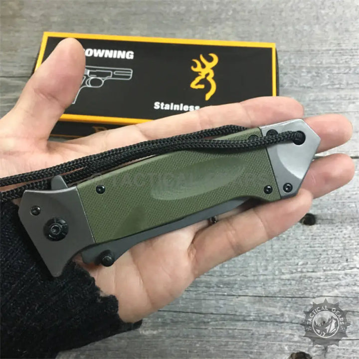 Browning DA73-1 olive green folding camping knife with black lanyard