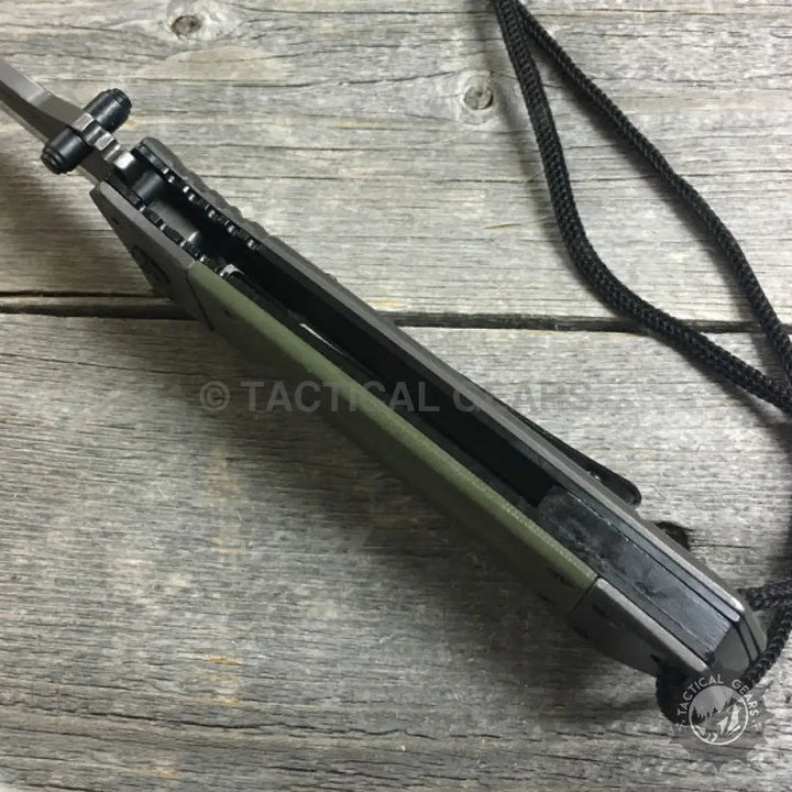 Browning DA73-1 olive green folding camping knife with black handle