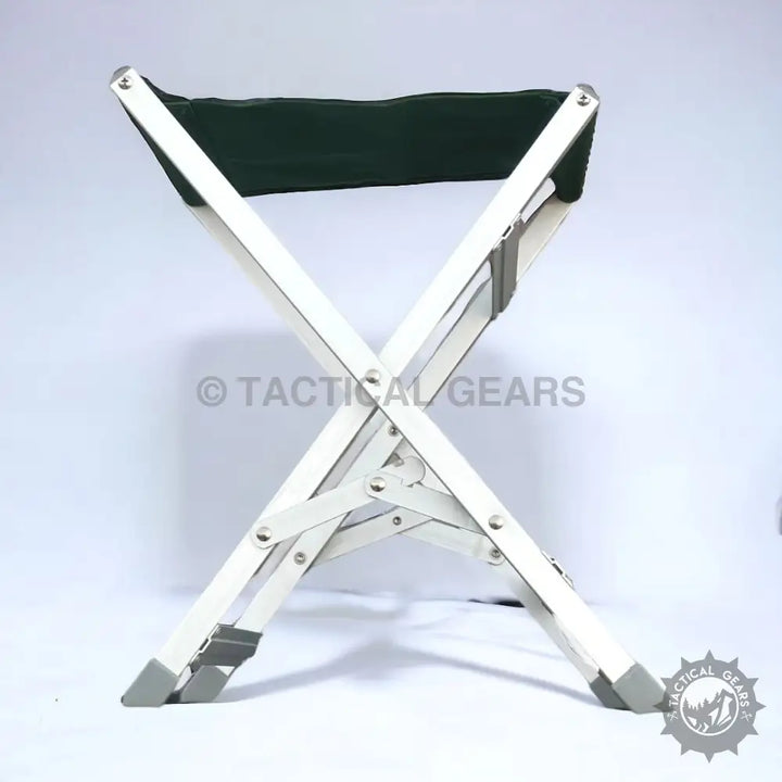 Foldable camping picnic stool with aluminum frame and dark green fabric seat
