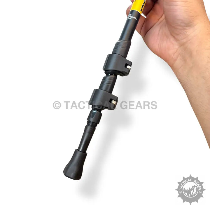 Black bipod with adjustable height legs and rubber feet for folding hiking sticks