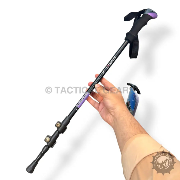 Black and purple adjustable folding hiking stick with wrist strap for versatile hiking adventures