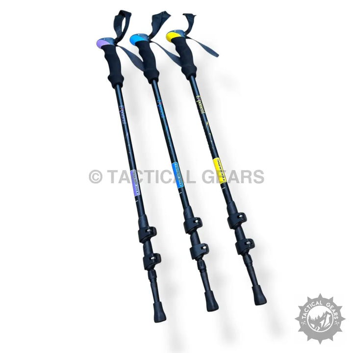 Adjustable height folding hiking stick with colorful handles and wrist straps for trekking