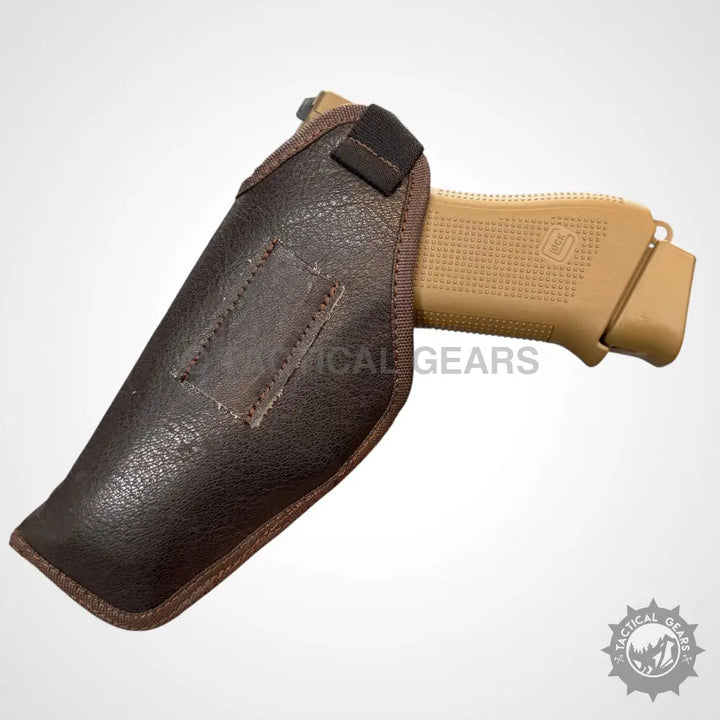 Dark brown leather-like Galco Gun Leather Holster for tan semi-automatic pistol