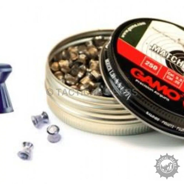 Gamo Match Pellets 22Cal with spilled Gamo Match Diabolo airgun pellets