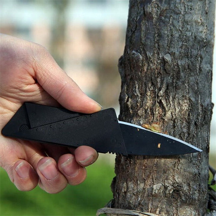 Black credit card-sized folding knife with serrated edge from Garberiel for tactical use