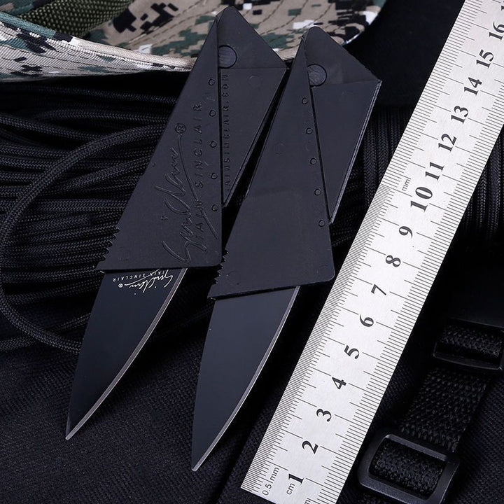 Black tactical credit card knives with partially serrated blades for versatile cutting