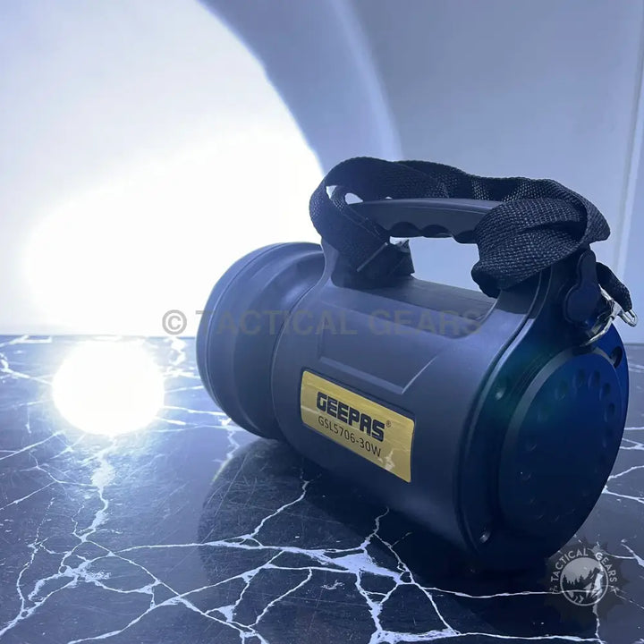 Black and yellow Geepas 1.5km range rechargeable LED search light for outdoor activities security