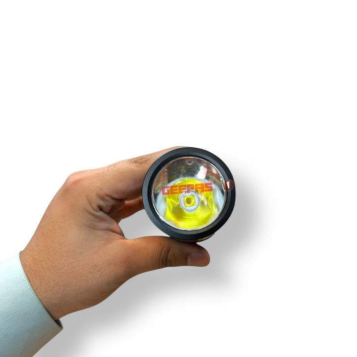 Geepas VIP Series LED Flashlight with Power Bank and bright yellow LED light in hand