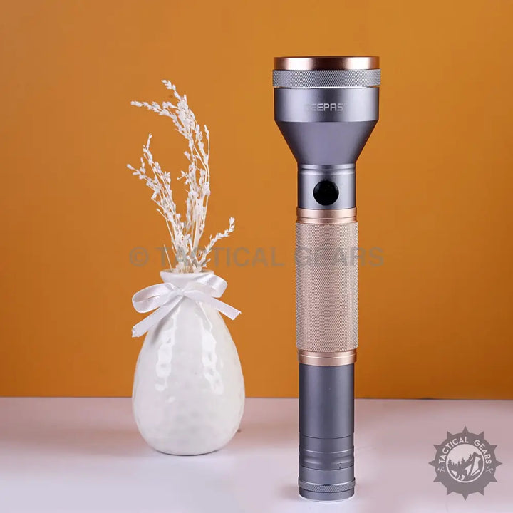 Gray and gold Geepas VIP Series LED Flashlight Power Bank with textured grip
