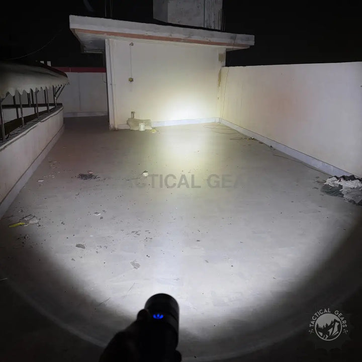 Geepas VIP Series LED Flashlight with Power Bank illuminating dark areas, 2-year warranty