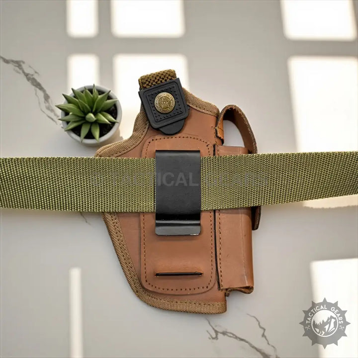 Genuine leather holster for 9mm pistols with green web belt and black metal clip