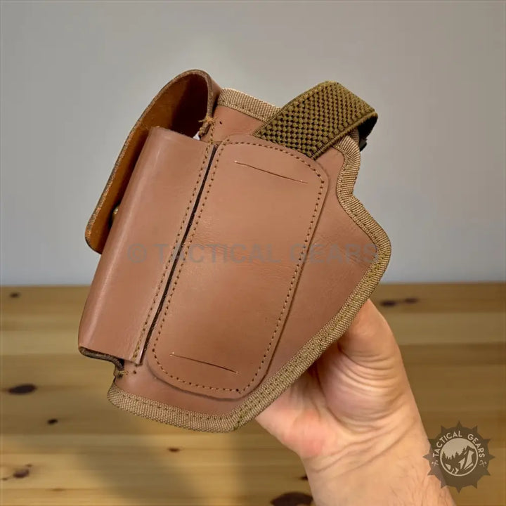 Genuine leather holster for 9mm pistols with woven strap and spare mag pouch