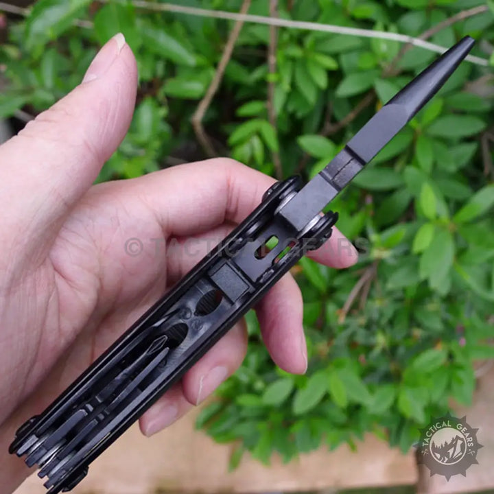 Gerber Bear Grylls Ultimate multi-tool with black tactical knife, pliers, screwdriver bits