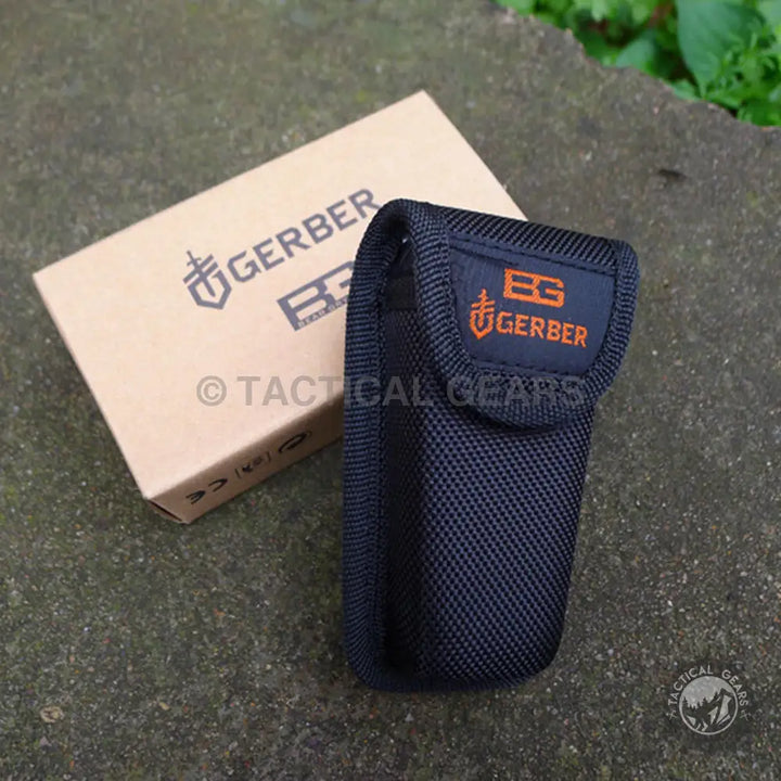 Black Gerber Bear Grylls Ultimate sheath with orange logo, nylon, bits
