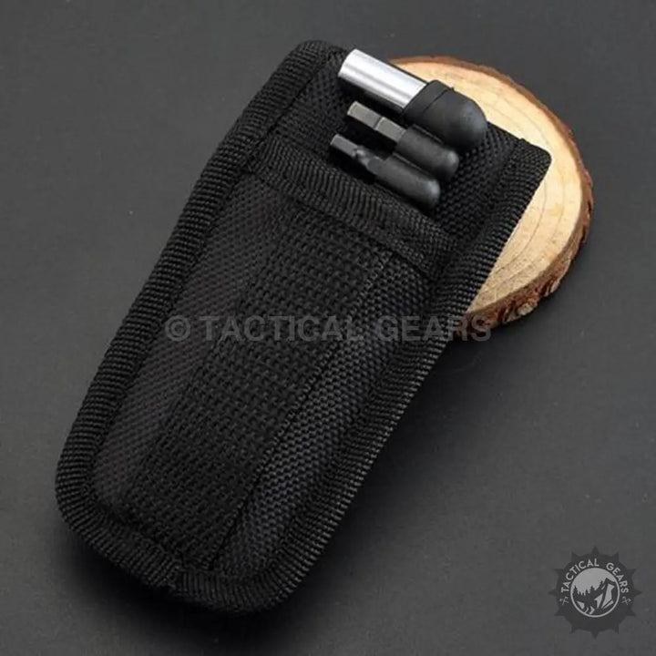 Gerber Bear Grylls Ultimate multi-tool black tactical pouch with silver hardware and screwdriver bits compartments