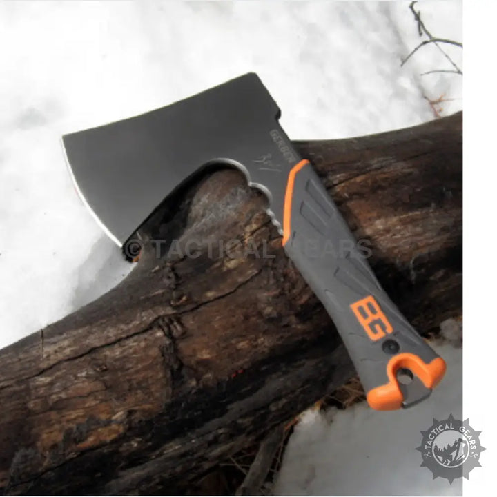 Gerber Gear Bear Grylls survival hatchet with black and orange tactical axe and silver blade