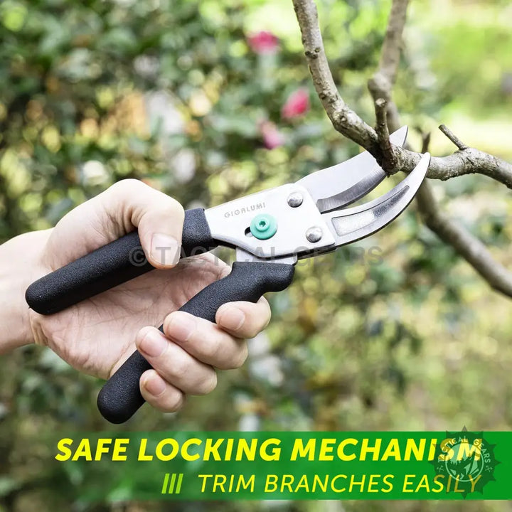 Hand-held gardening pruning shears with black handles and green locking mechanism in GIGALUMI tool set