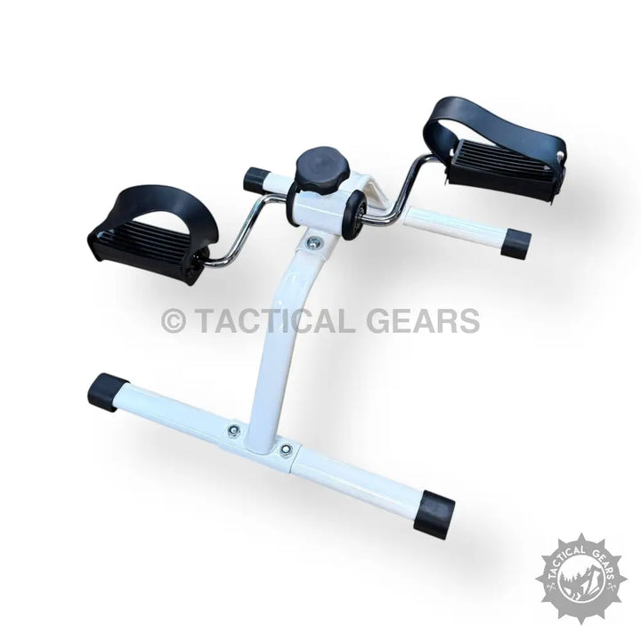 White portable pedal exerciser with black foot straps and resistance knob for easy pedal exerciser workouts