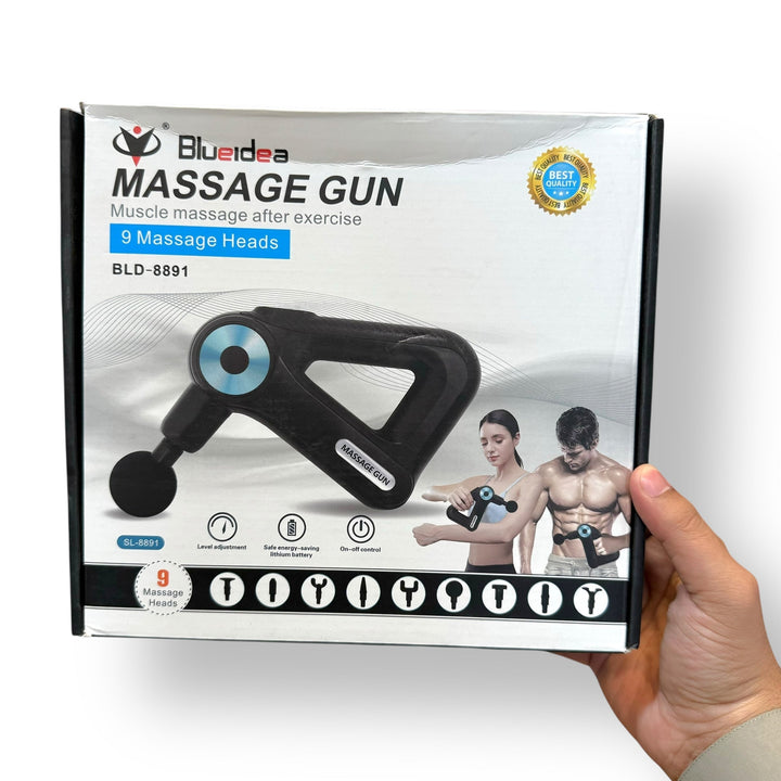 Black handheld muscle massager with 9 heads in packaging for post-exercise muscle relief