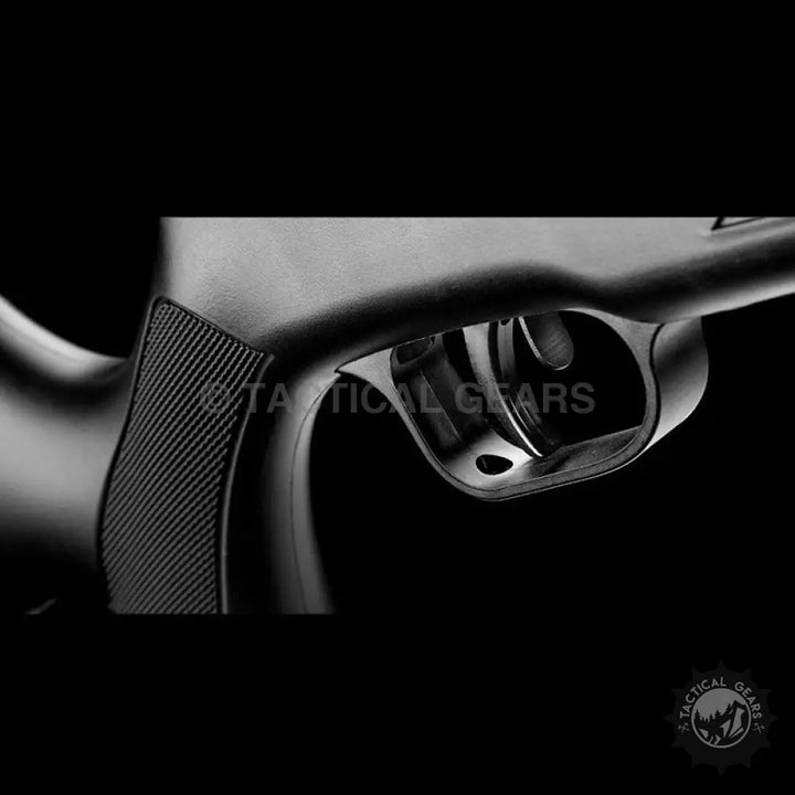 Close-up of Artemis SR1000S PCP Airgun trigger and textured grip emphasizing safety and force