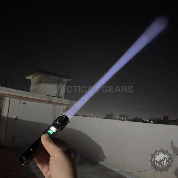 Black High Power Emergency Flashlight with glowing purple beam and green indicator lights