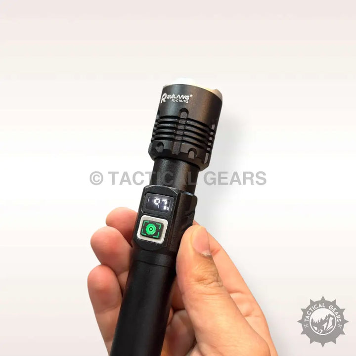 Black handheld flashlight with digital display and green power button for high power emergency use