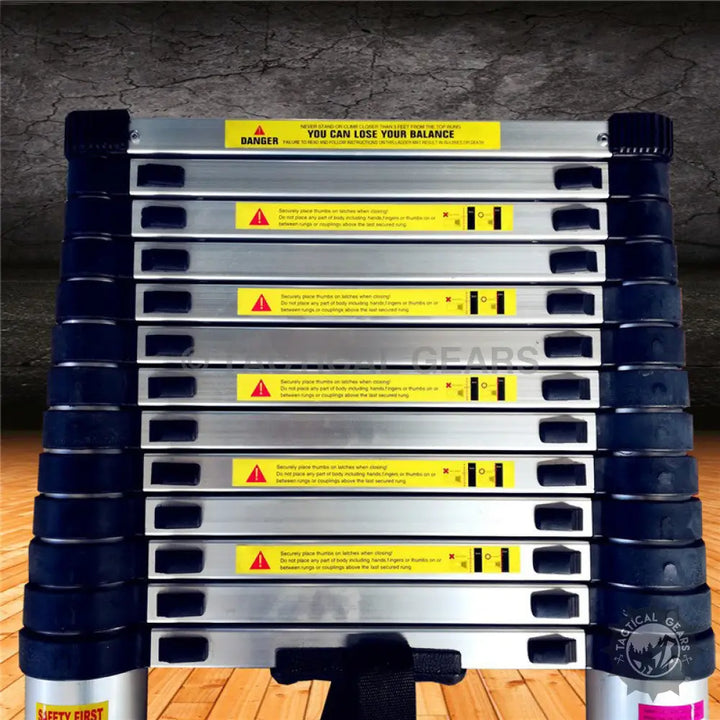 High quality silver and black telescopic ladder with safety warnings for Portable Aluminum Ladder
