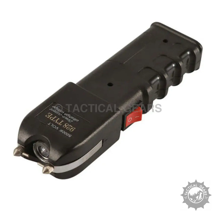 Black stun gun with integrated flashlight and red power switch for high voltage protection