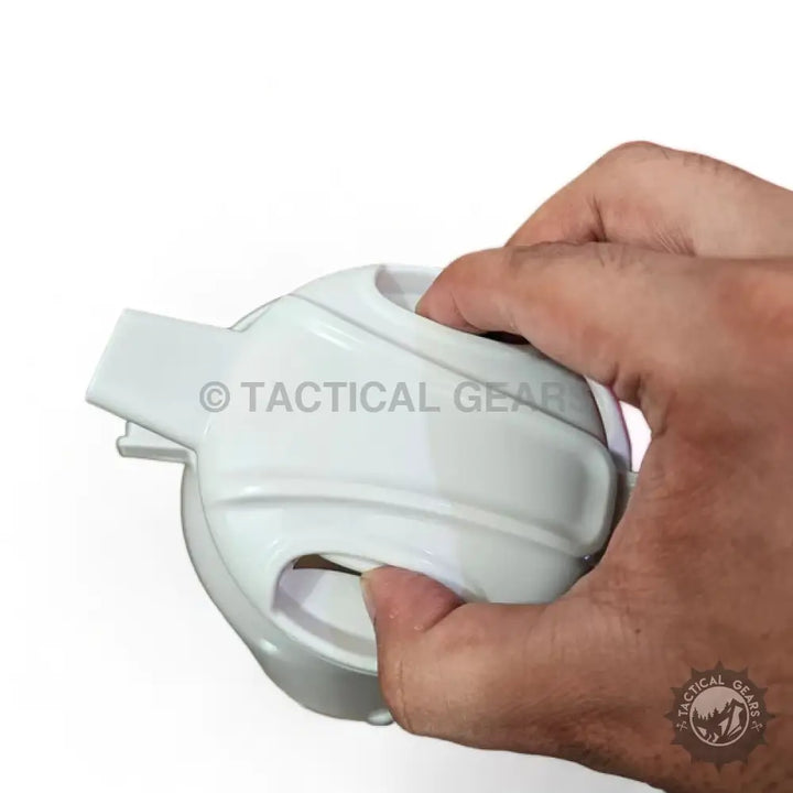 White ergonomic handheld fruit peeler next to Imported 1500ml Glass Vacuum Thermos