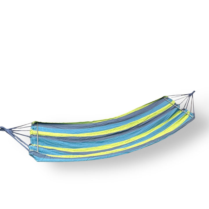 Imported hammock made of green striped fabric with blue, yellow, and grey stripes