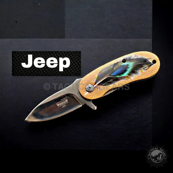 Jeep mini folding knife with stainless steel blade and wooden handle featuring vibrant feather design
