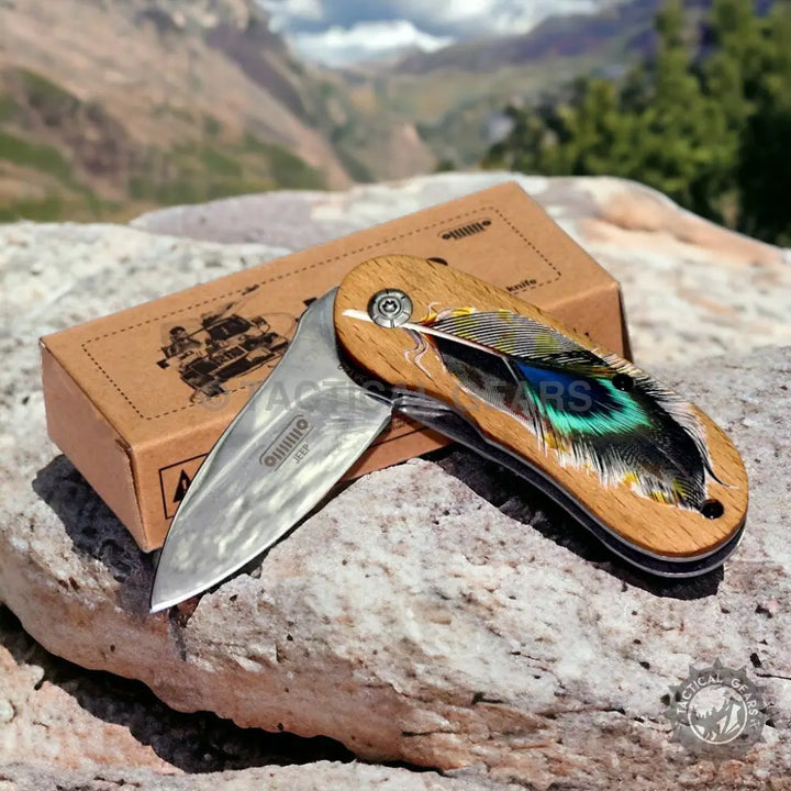 Jeep mini folding knife with stainless steel blade and wooden handle featuring colorful feather inlay