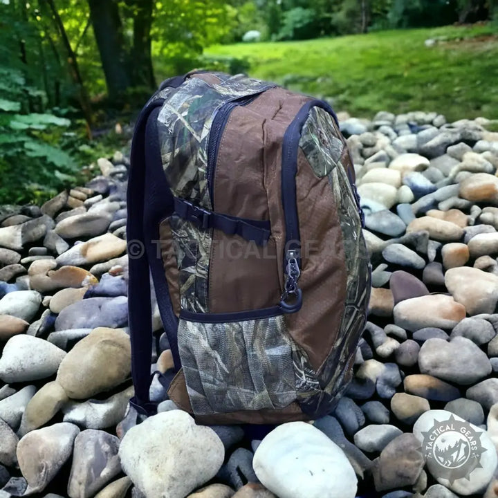 Brown and camouflage tactical backpack with multiple compartments, ideal for hiking and camping