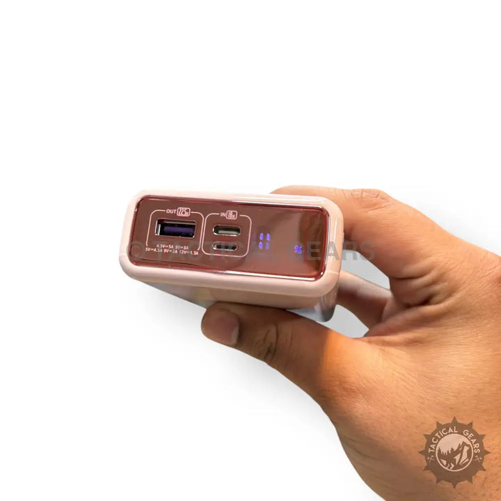 Light pink Kamal 67W Gradient Super Fast Power Bank with digital display and multiple ports