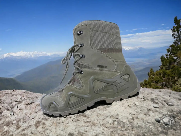 Gray tactical boots with laces, ideal for outdoor hiking and tactical activities
